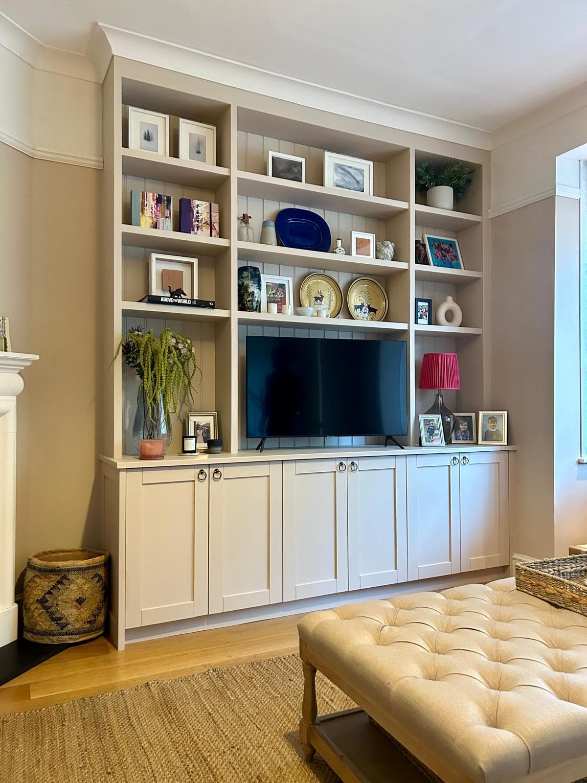 Alcove shelving and built-in TV unit in a living room