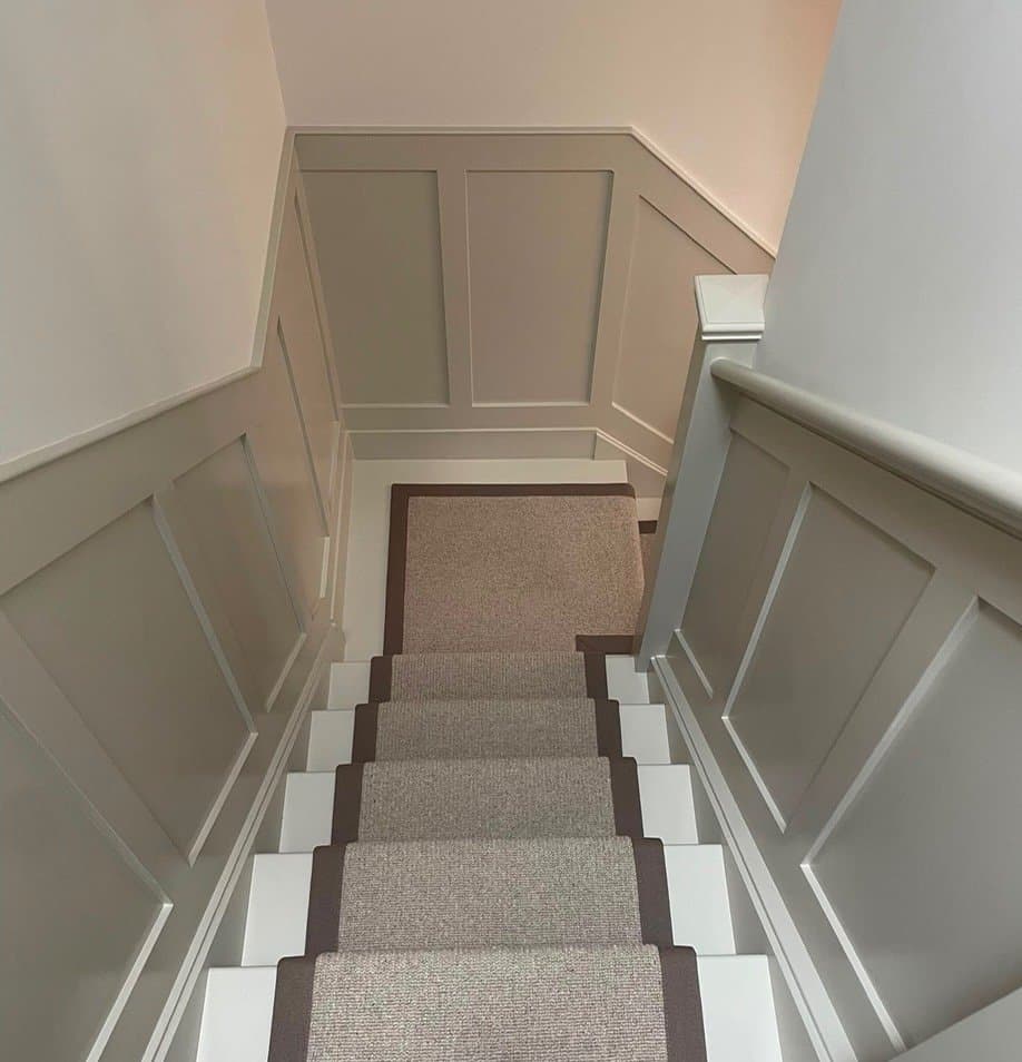 Bespoke timber panelling following the line of a staircase